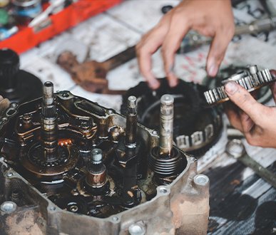 professional mechanic performing an engine overhaul